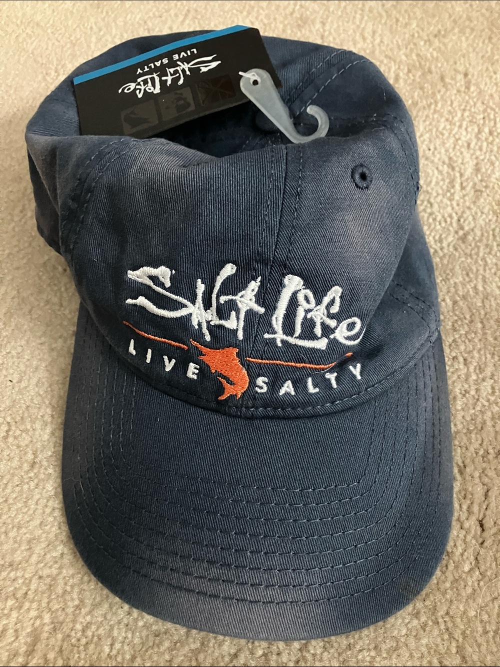 Salt Life Live Salty distressed Navy Cap with Orange Fish Embroidery